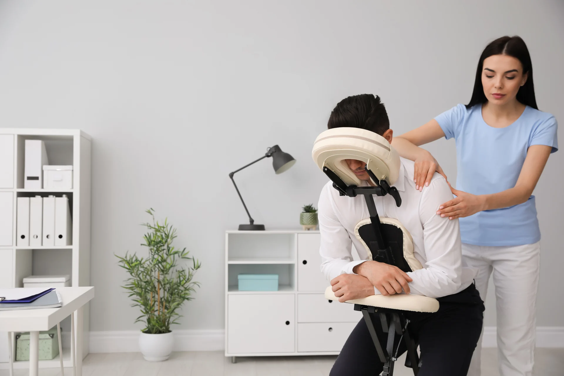Practitioner assessing a patient’s movement